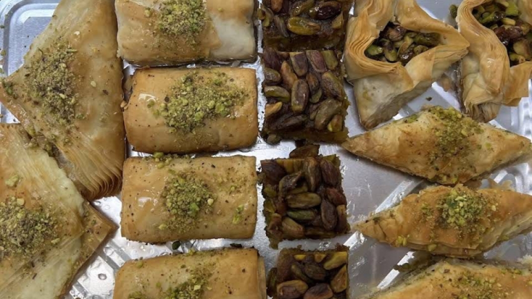 tray of Middle Eastern desserts including baklava 