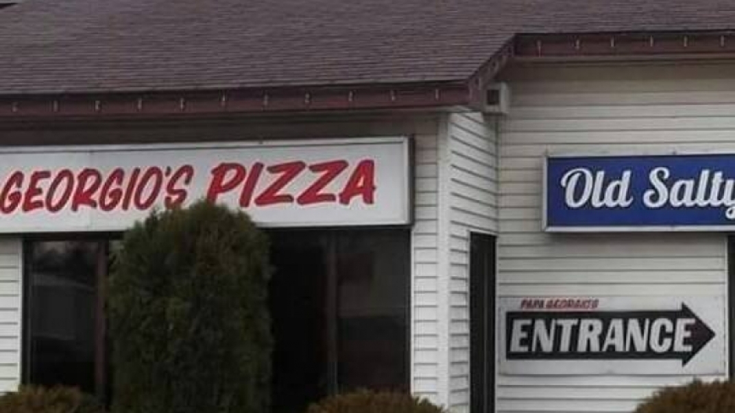 Storefront of Georgios pizza 