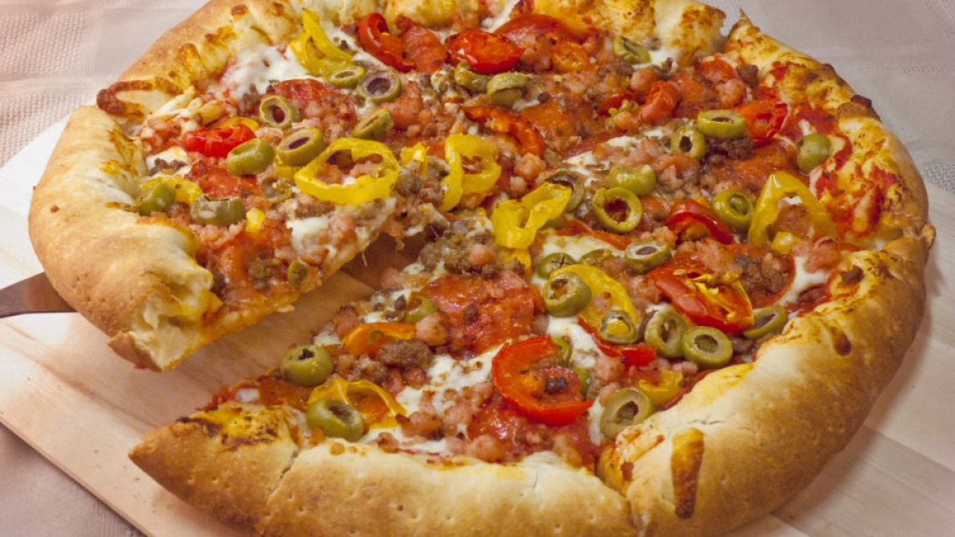 pizza with golden crust and various toppings