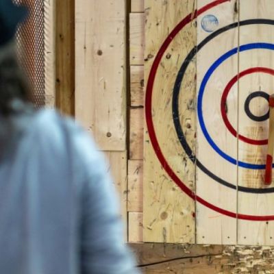Axe on bullseye at axe throwing place