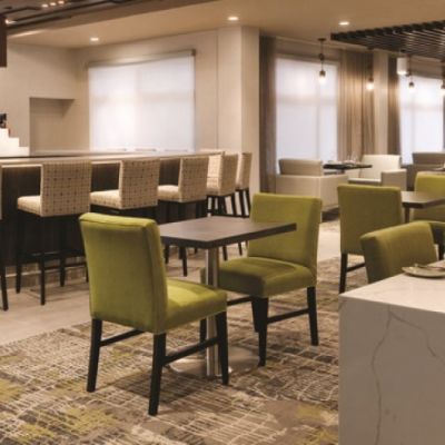 restaurant with white a green chairs