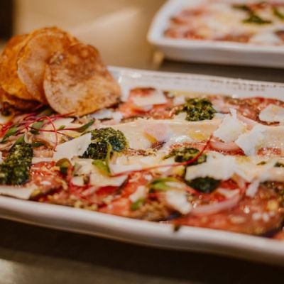 plate of appetizers with meat and cheese