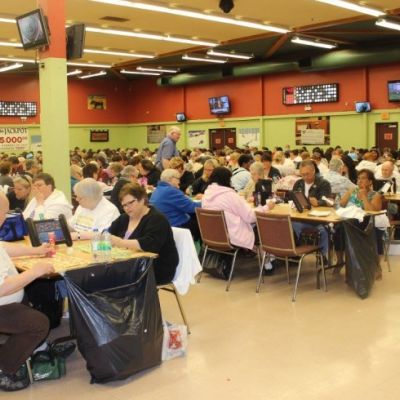 Room of elderly people playing bingo