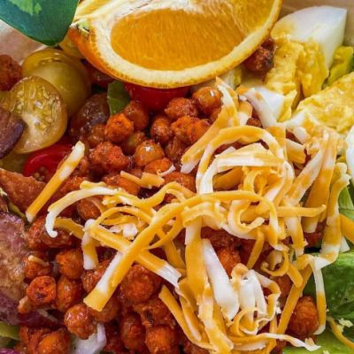 cobb salad with bacon, cheese, egg and avocado