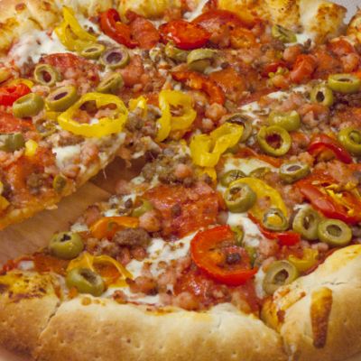 pizza with golden crust and various toppings