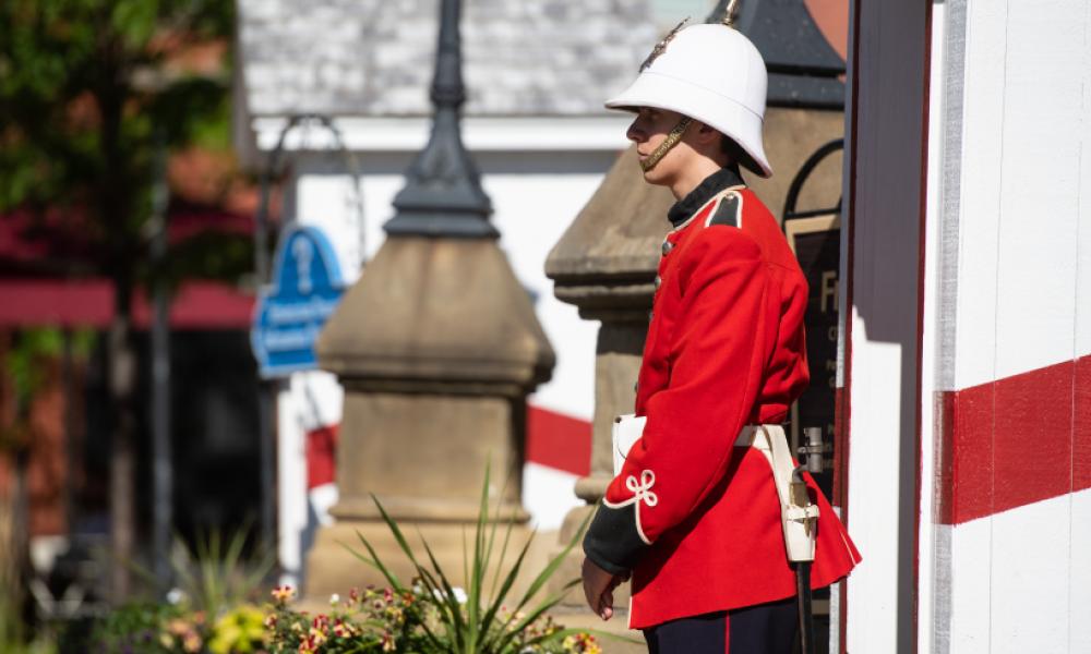 ceremonial guard standing on the street