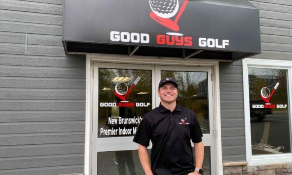 Good Guys Golf staff member standing in front of store
