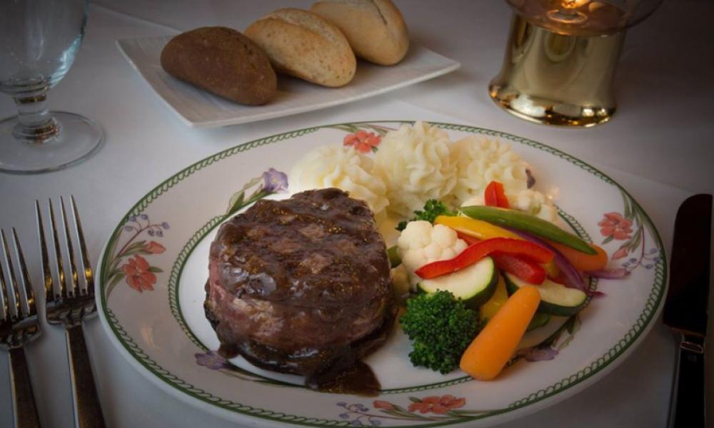 Steak, mashed potatoes and vegetables on a plate